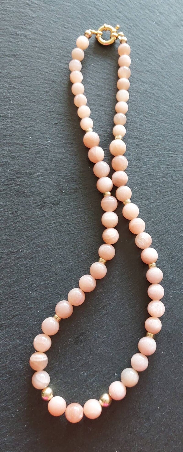 Zonnesteen ketting 8 mm met vermeil tussenkralen en boeisluiting