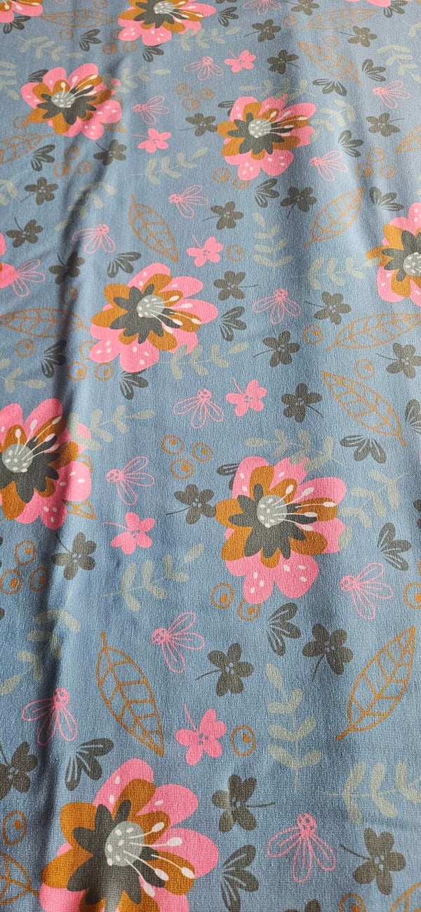 1043 Stoff Baumwolljersey gelb mit Blumen