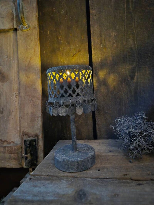 Lamp met muntjes kaars