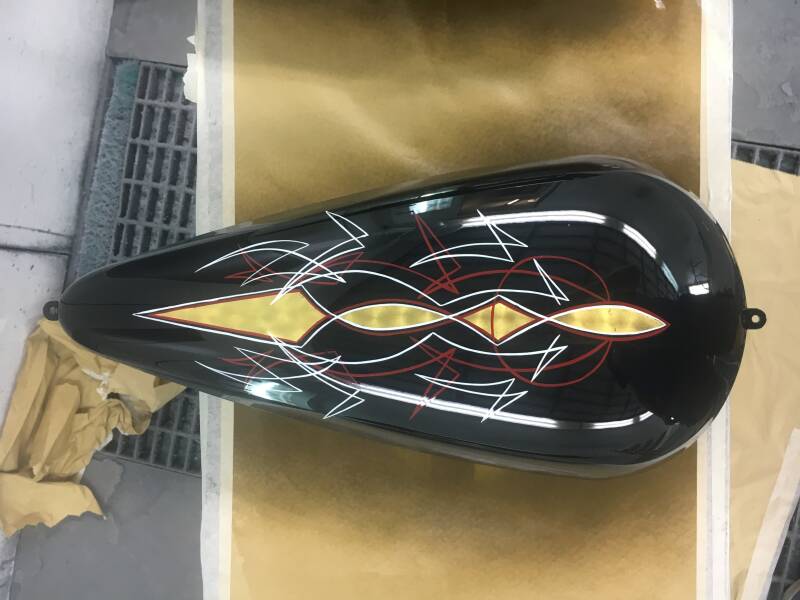 Pinstriping en gold leaf