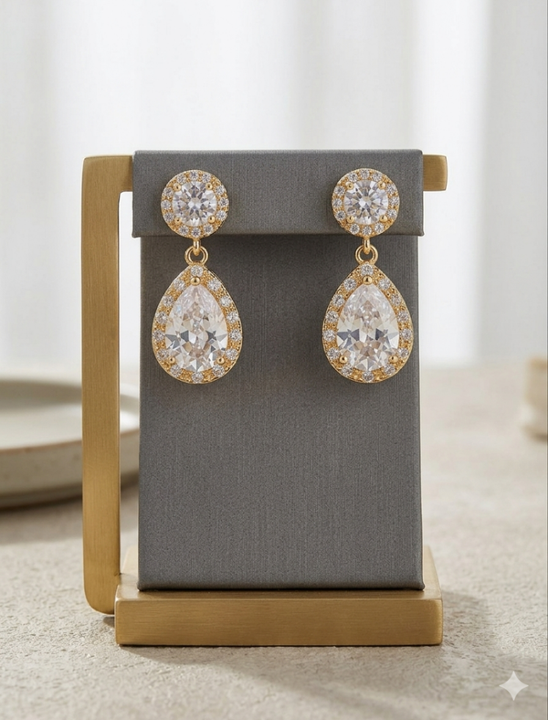 PENDIENTES EN PLATEADO/DORADO CON FORMA DE LAGRIMA