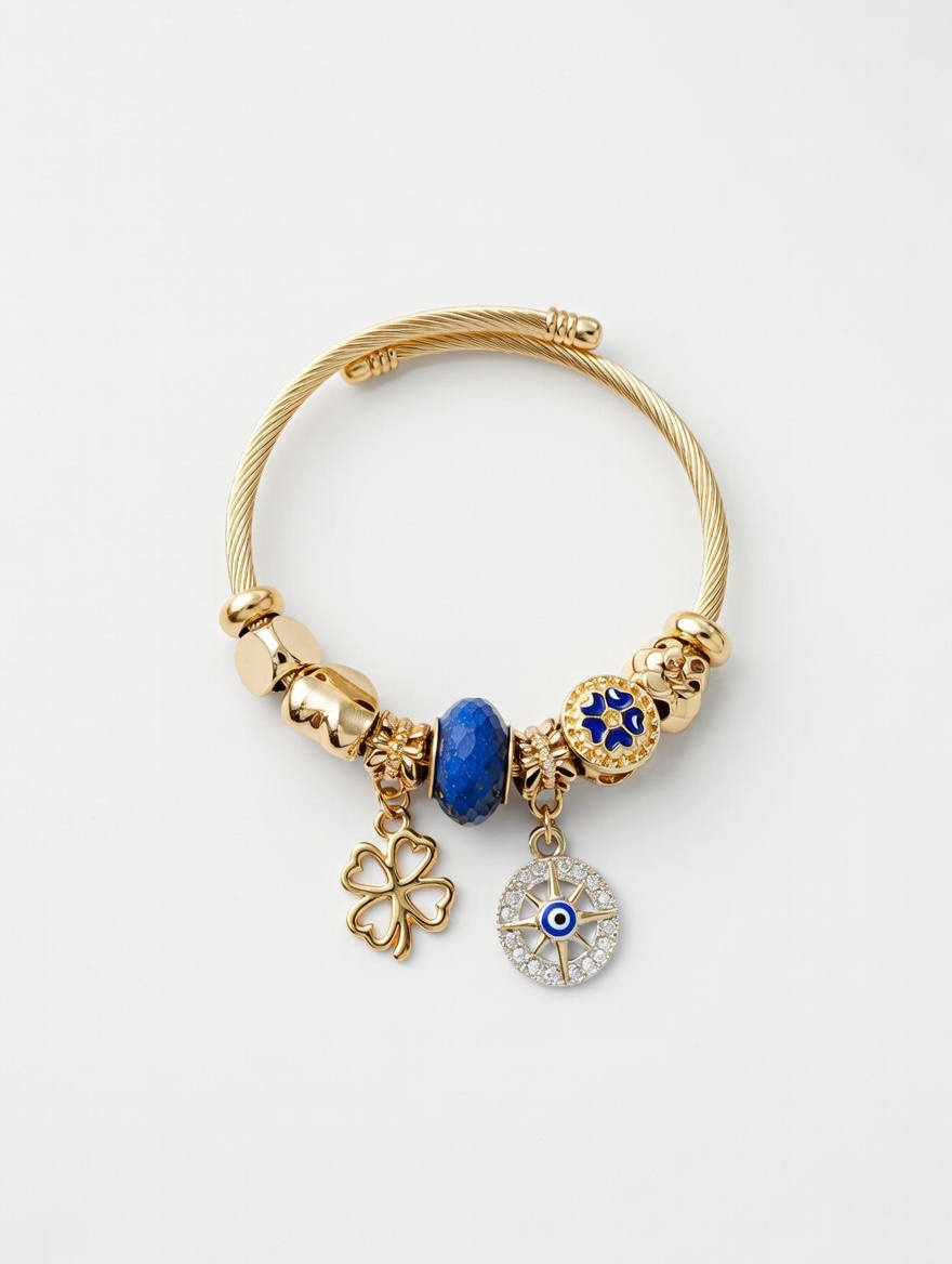 PULSERA CON ABALORIOS EN DORADO TREBOL Y OJO TURCO