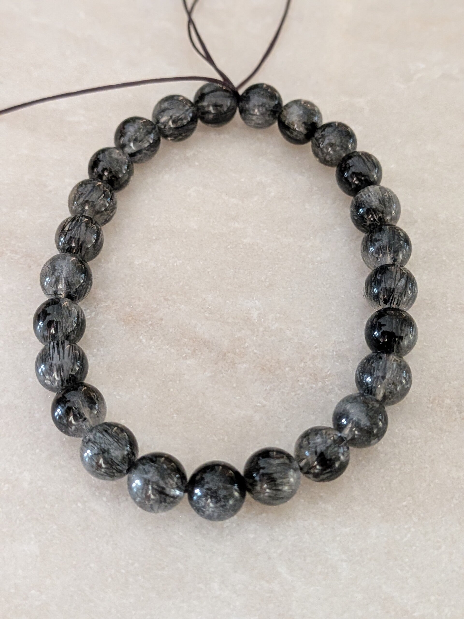 Zwarte rutiel armband 7MM
