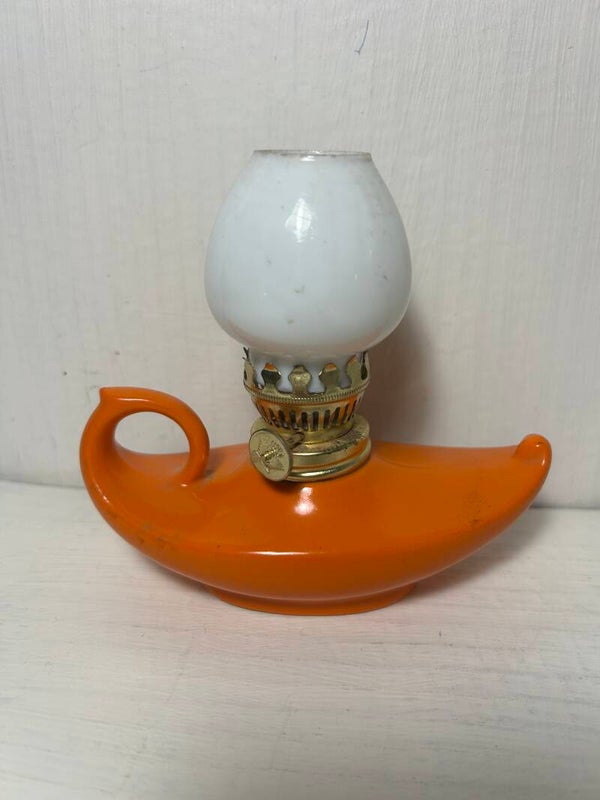 Vintage orange kerosene lamp
