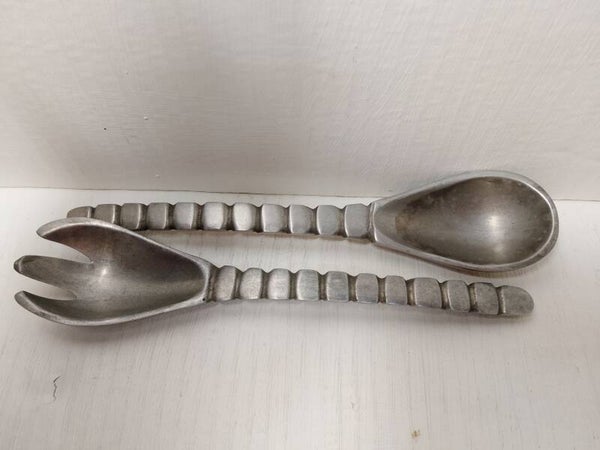 Retro vintage metal salad servers.