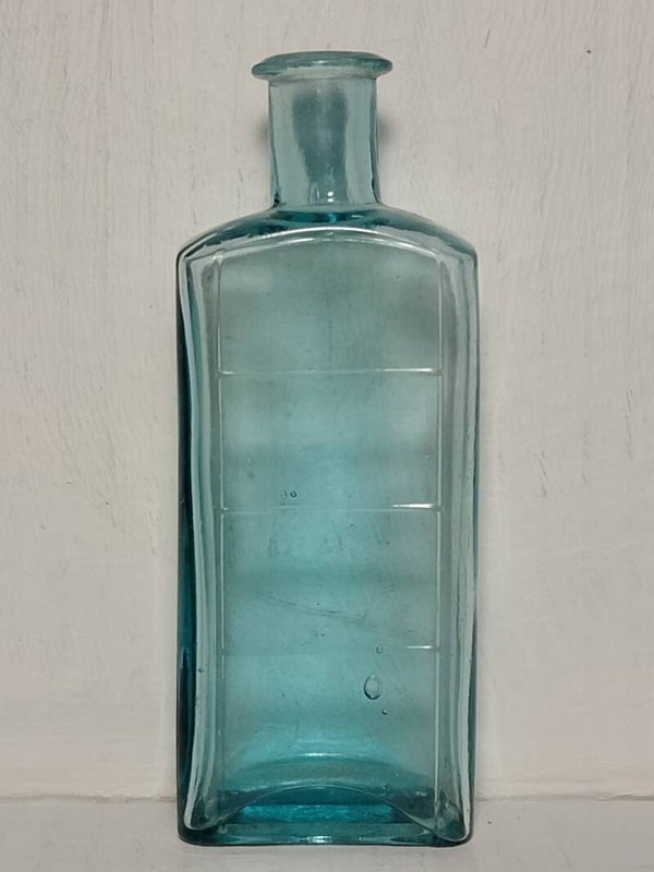 Antique rolled lip medicine bottle.