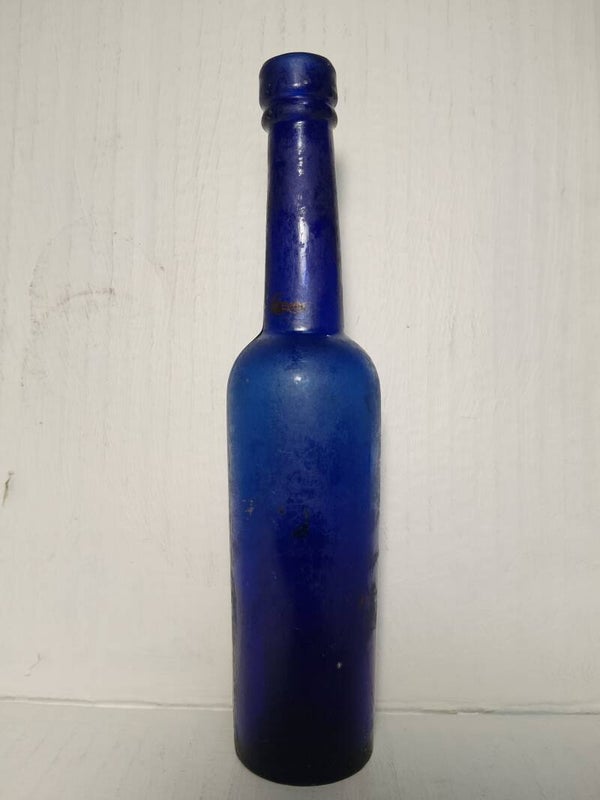 Antique cobalt blue caster oil bottle.