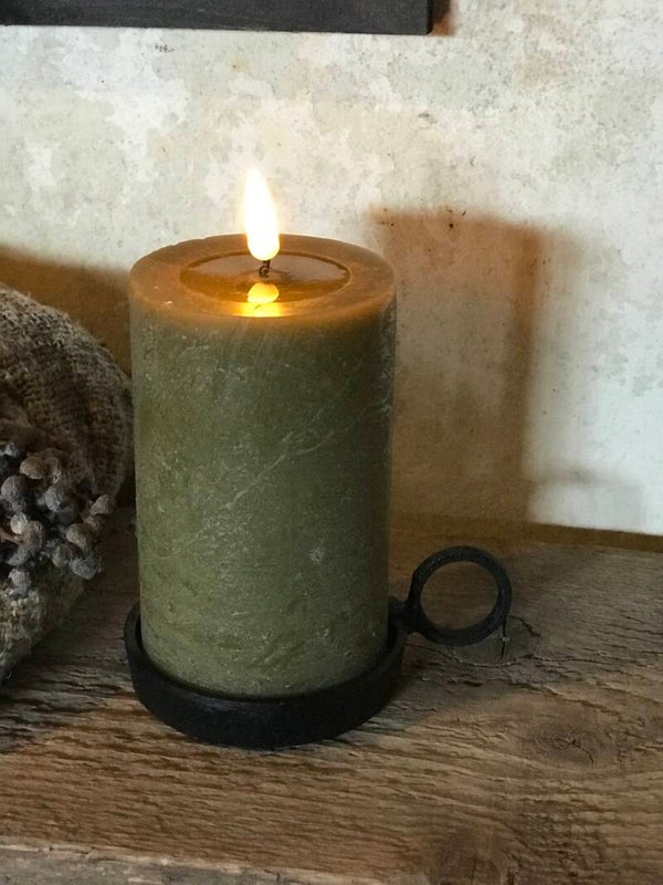 Zwarte kaarsenplateau met oor