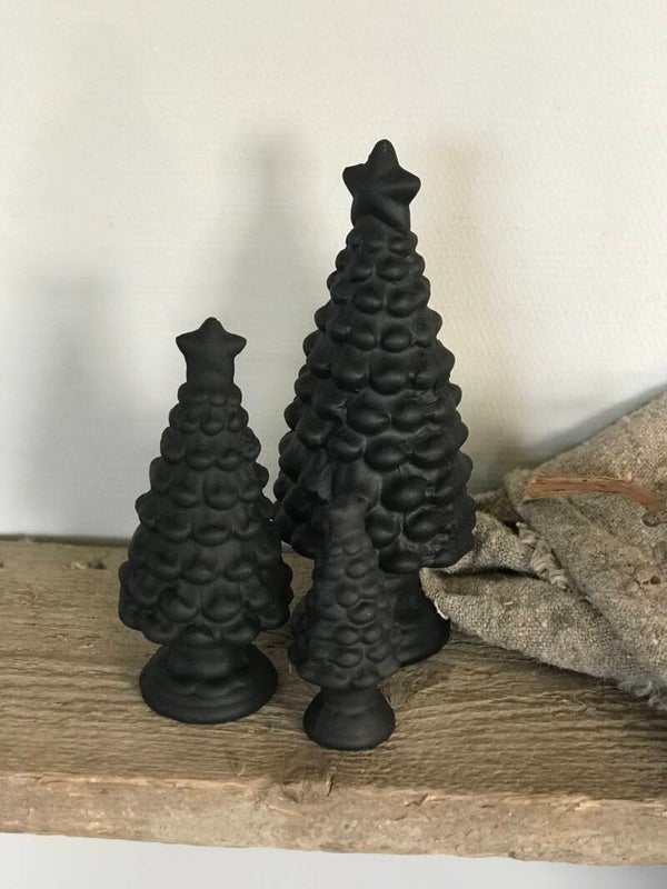 Zwarte stenen kerstbomen