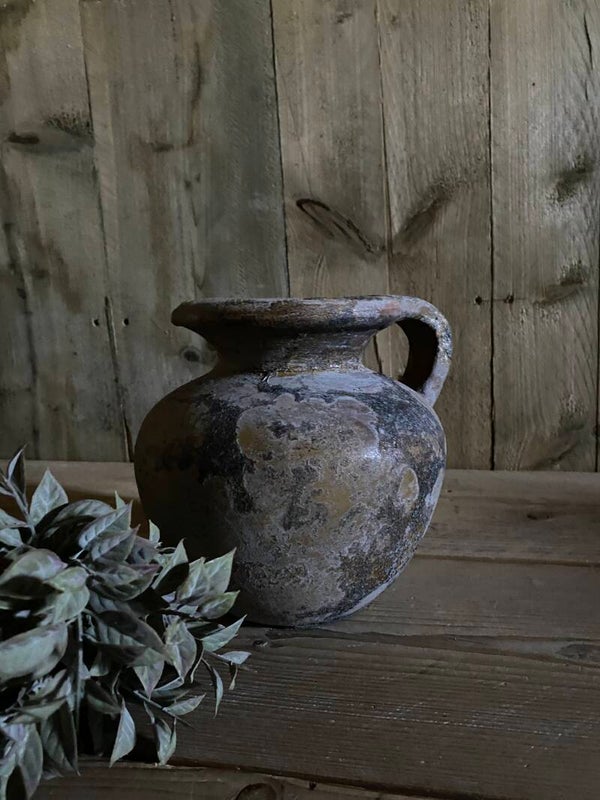 Gemêleerd grijze kruikje met een gele twist