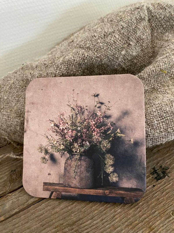 Pot met roze bloemen