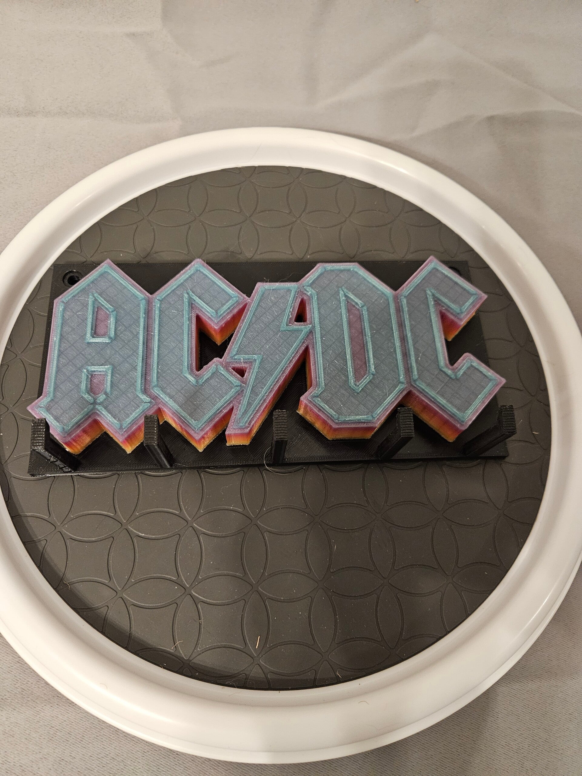 This ACDC key hanger was make from rainbow glow  filament  I love it.