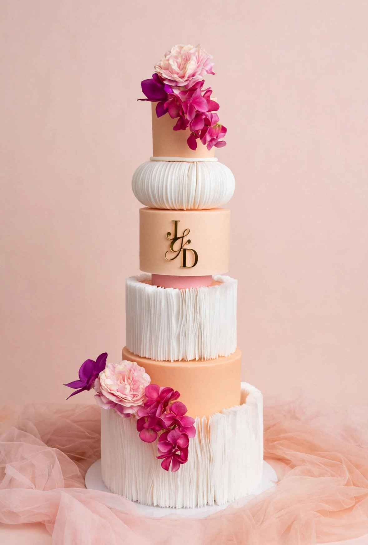 Anniversary cake decorated with pastel coloured buttercream flowers & a written message.