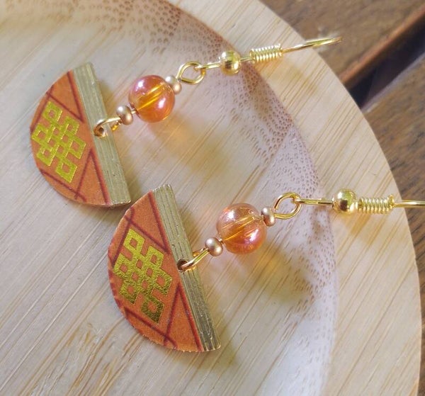 Boucles d'oreilles noeud tibétain orange et doré