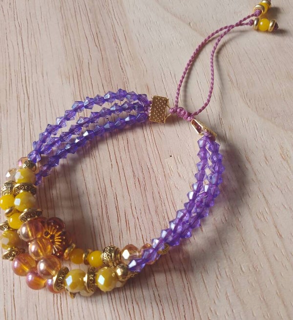 Bracelet de perles orange, jaune et violet