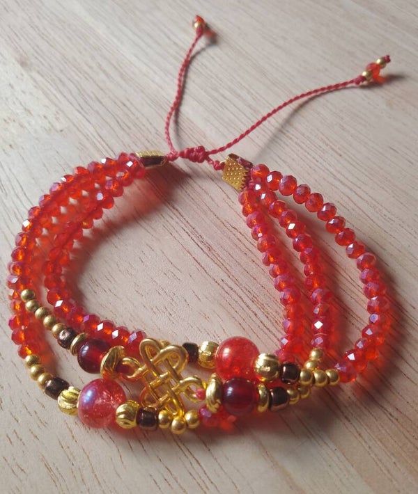 Bracelet de perles noeud tibétain rouge et doré