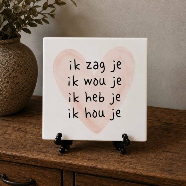 Tegeltje: Ik zag je, ik wou je, ik heb je, ik hou je