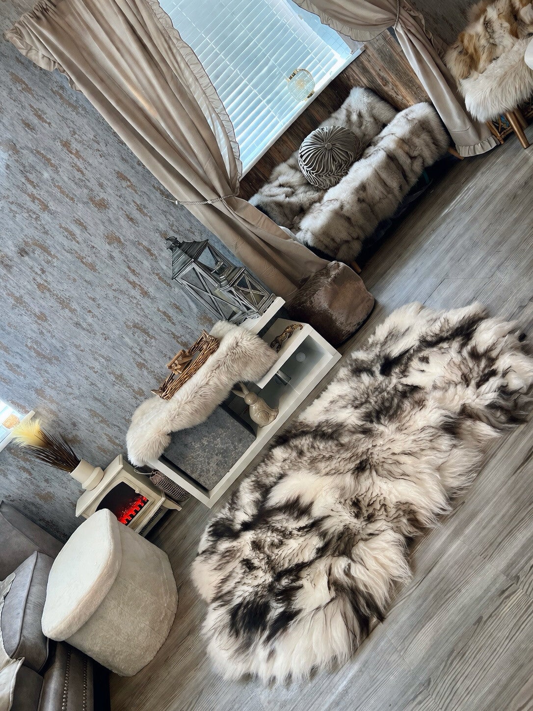 Black and white genuine sheepskin fur rug
