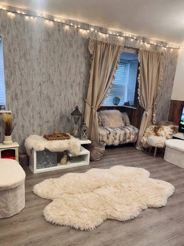 Cream coloured genuine sheepskin fur rug