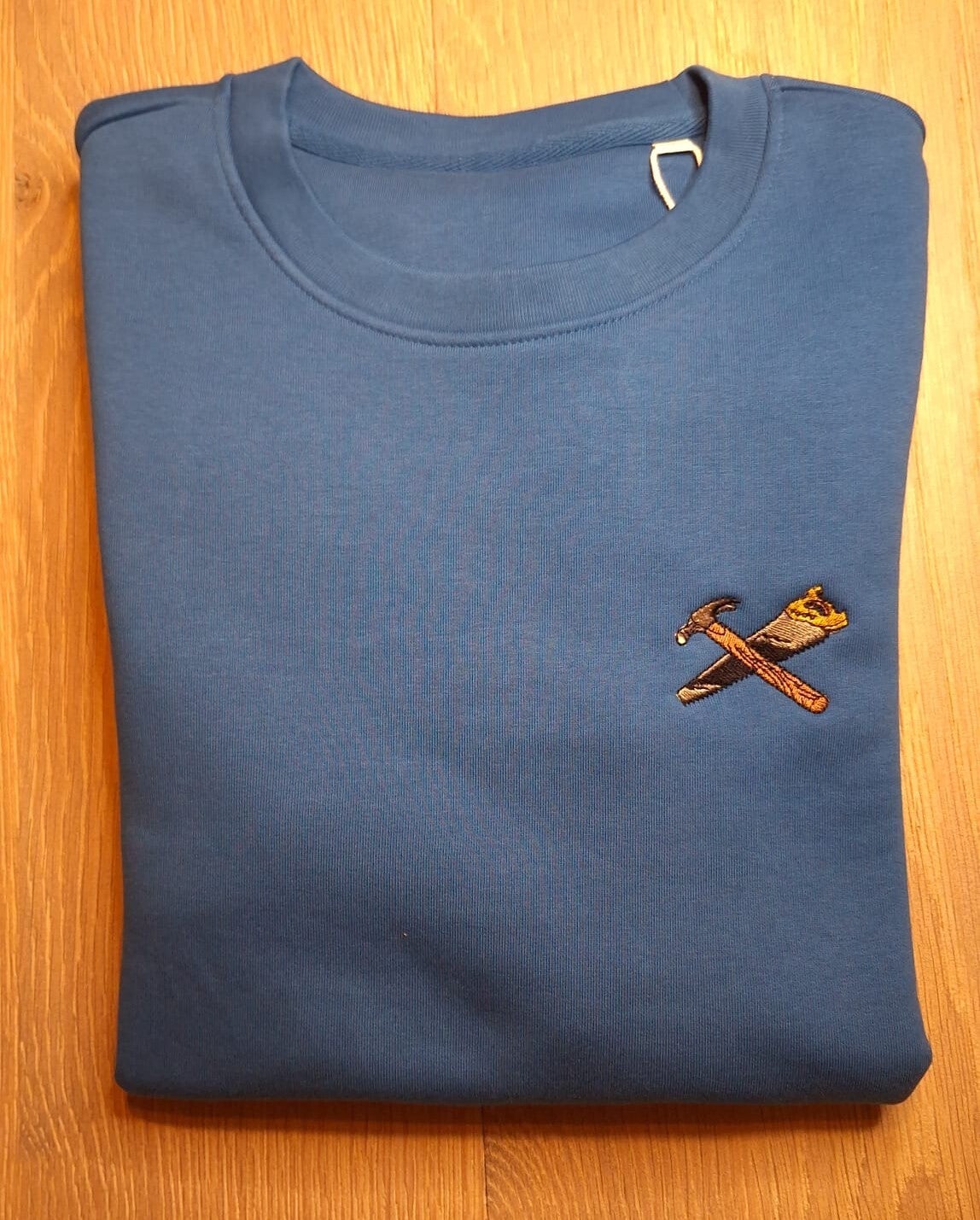 Gepersonaliseerde trui volgeborduurde tekening borst