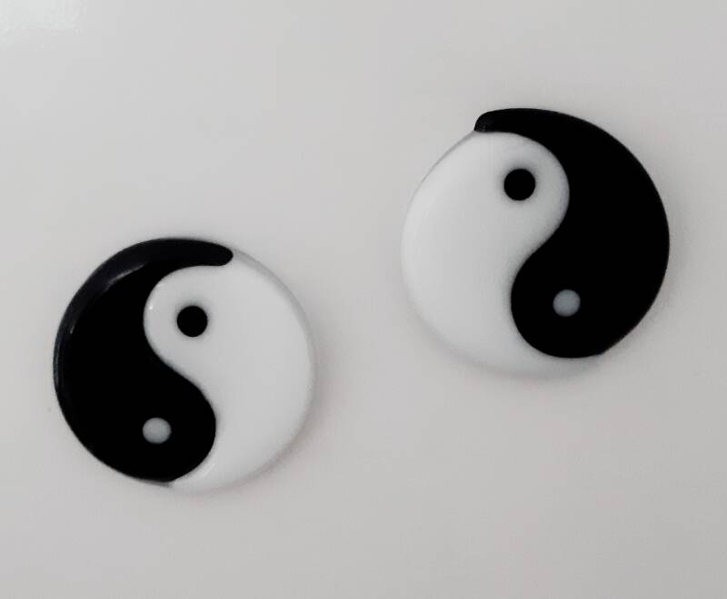 Yin Yang van glas als magneet.