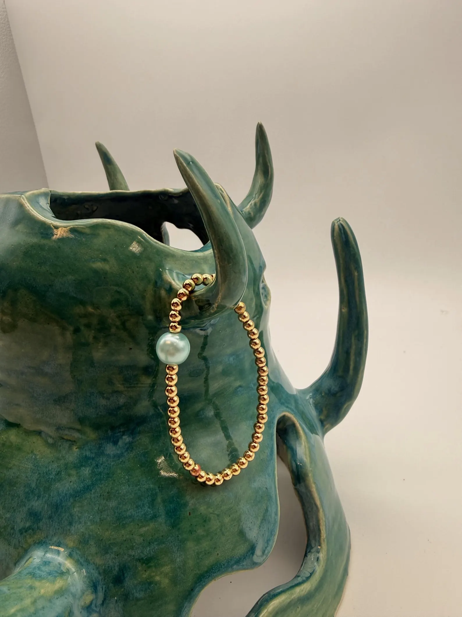 Gold Beaded Bracelet with Accent