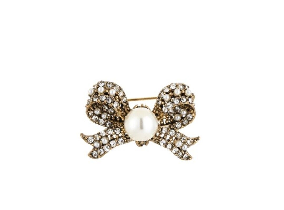 Broche strik en parel