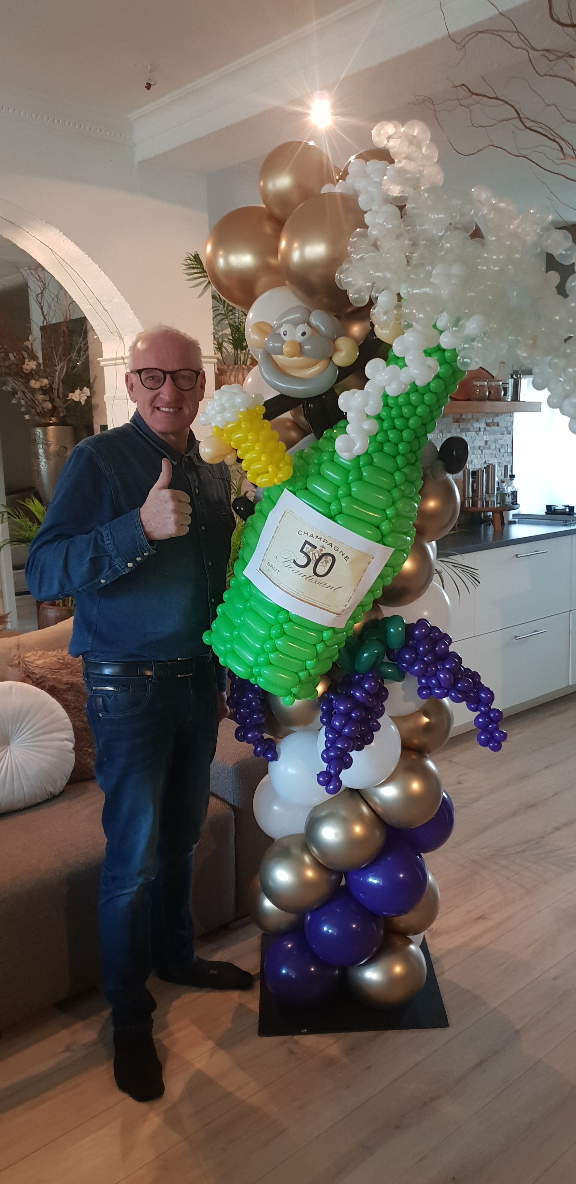 Ballonpilaar met champagne fles 