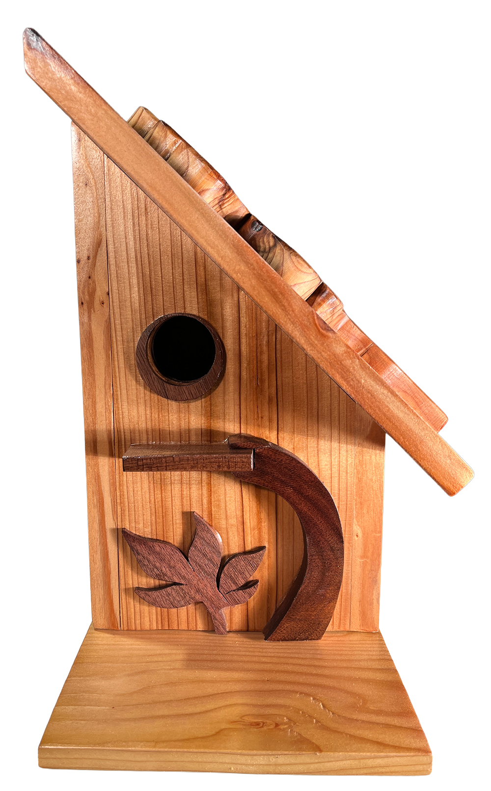 Handmade bird houses are crafted from wood with a natural finish