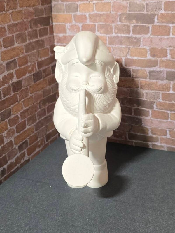 Lutin du père Noël avec saxophone