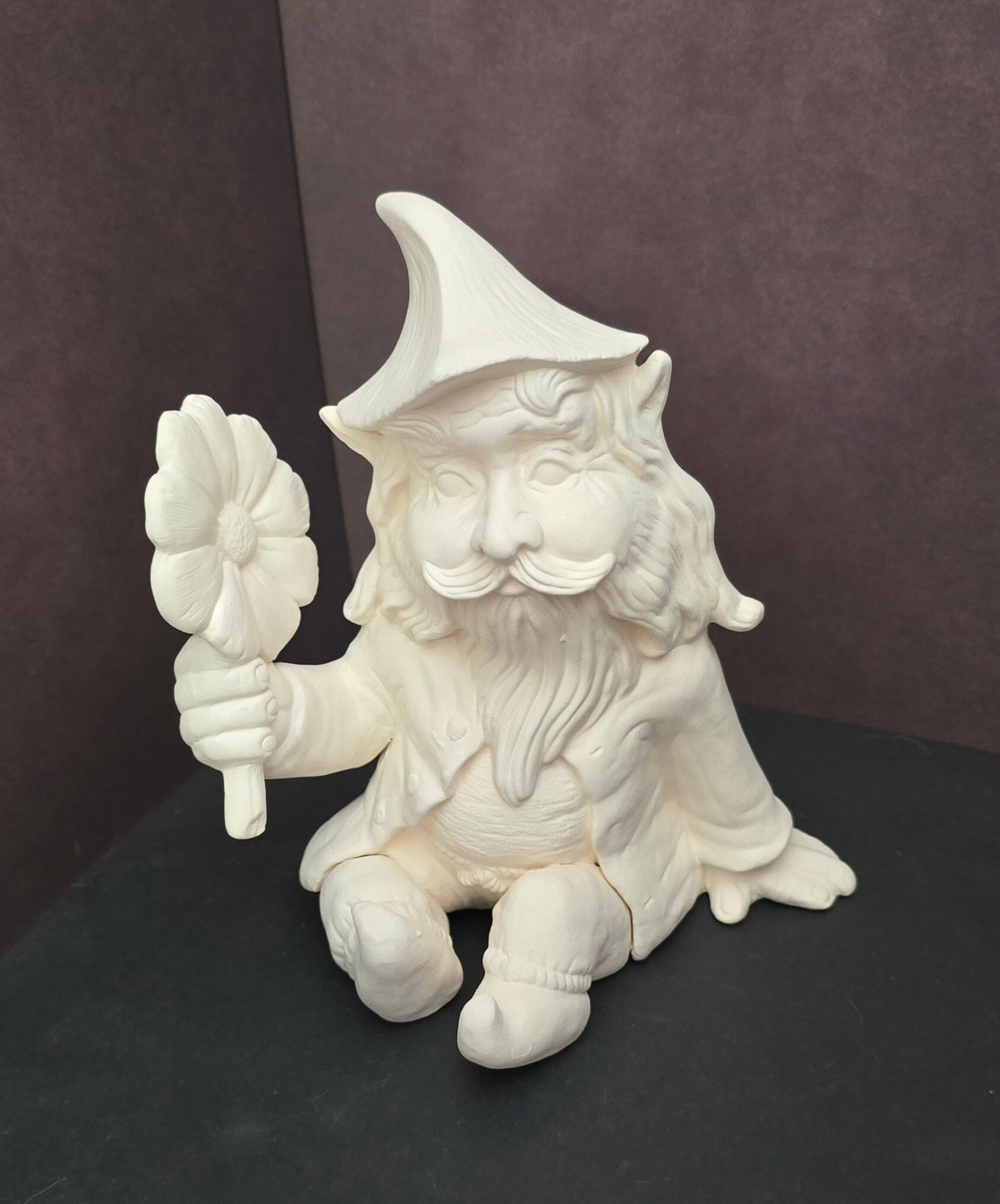 Gnome avec une fleur #560