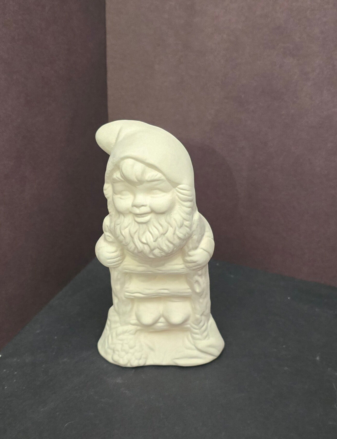Gnome dans une échelle