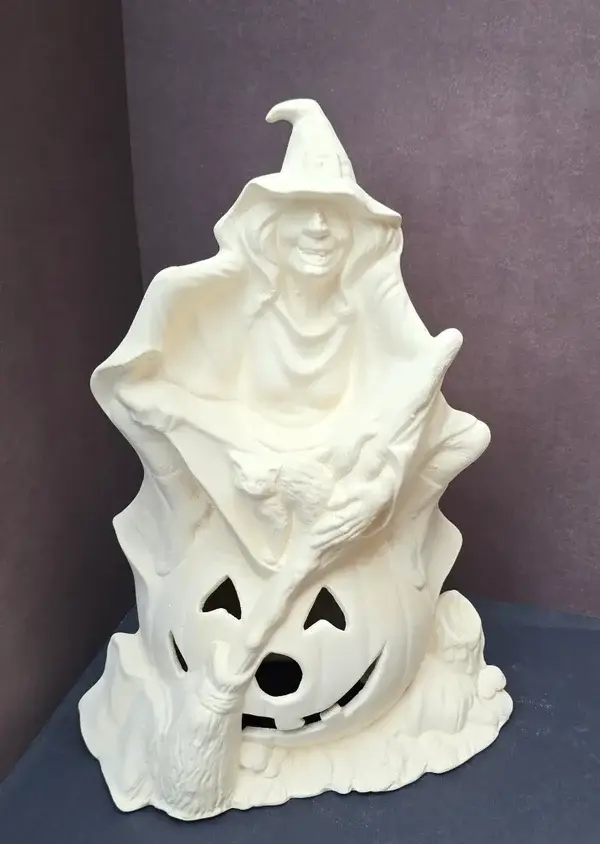 Sorcière assise sur une citrouille #88