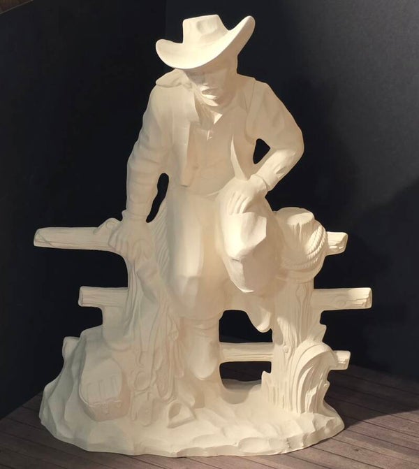 Cowboy sur la clôture