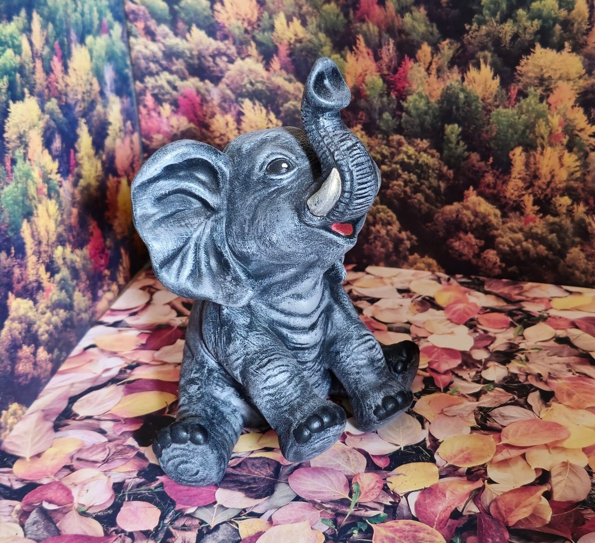 Petit éléphant assit #2032