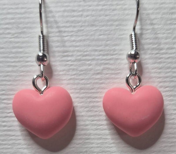 Mooie roze hartjes oorbellen.