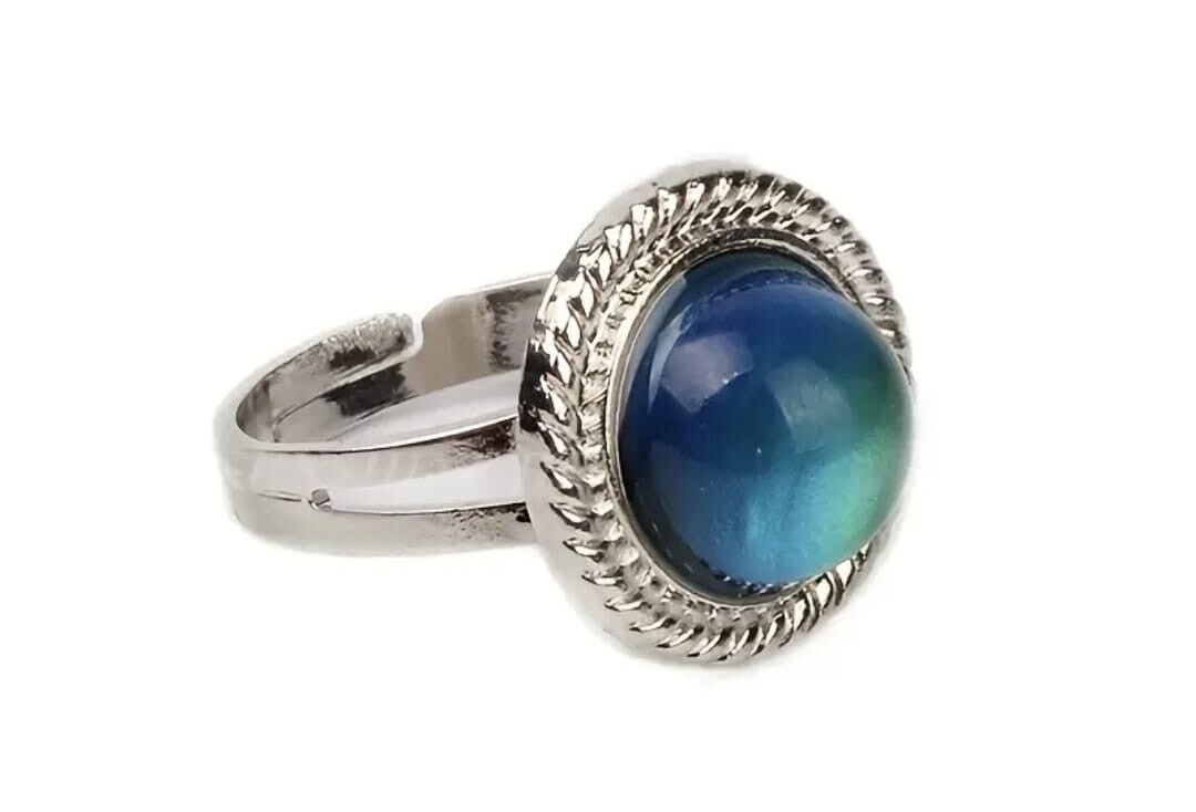 Verstelbare stemming ring met kleur veranderde edelsteen.