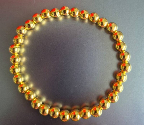 Mooie gouden armband voor kinderen.