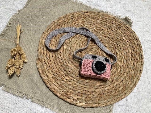 Foto camera aan koord
