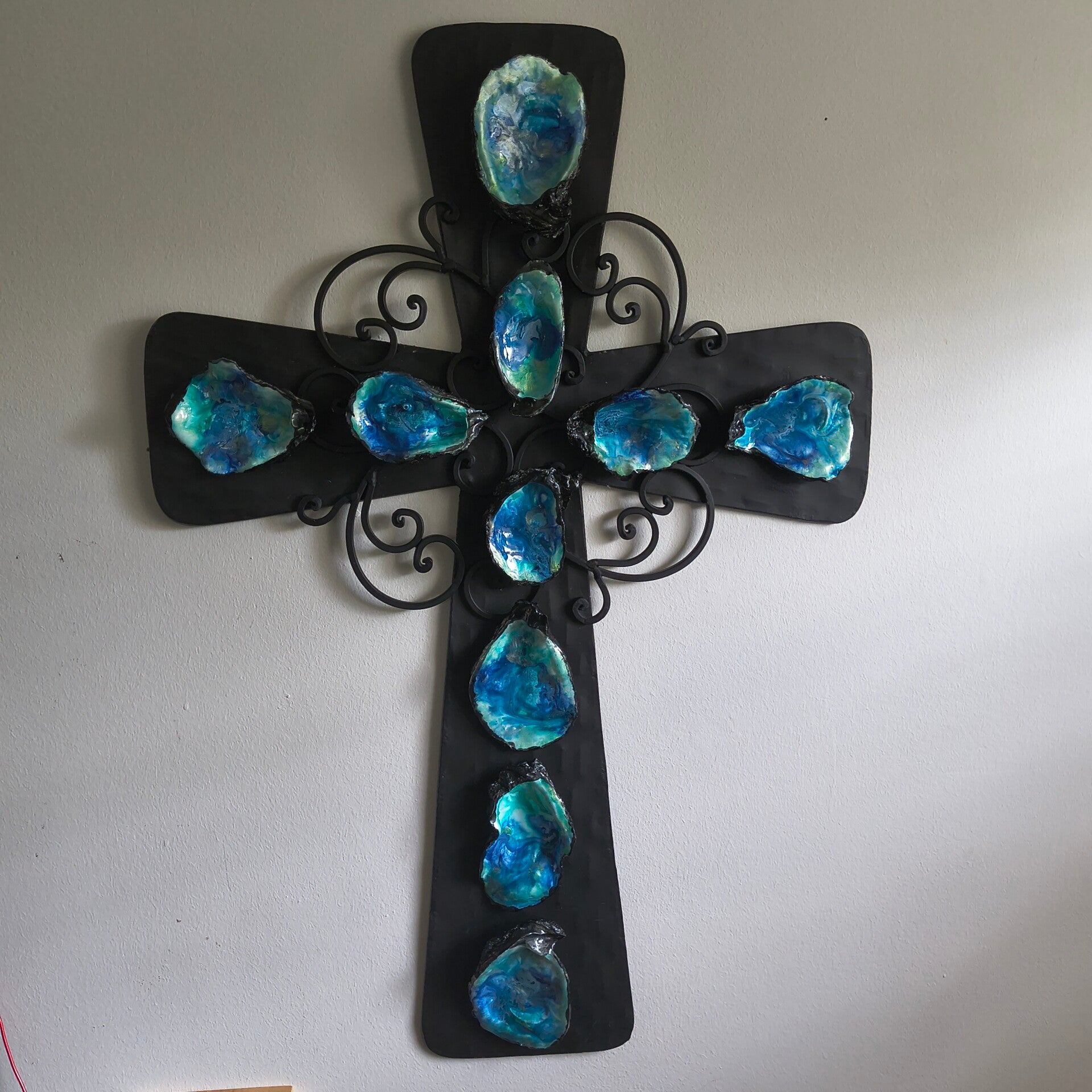Black iron cross with oyster shell accent's