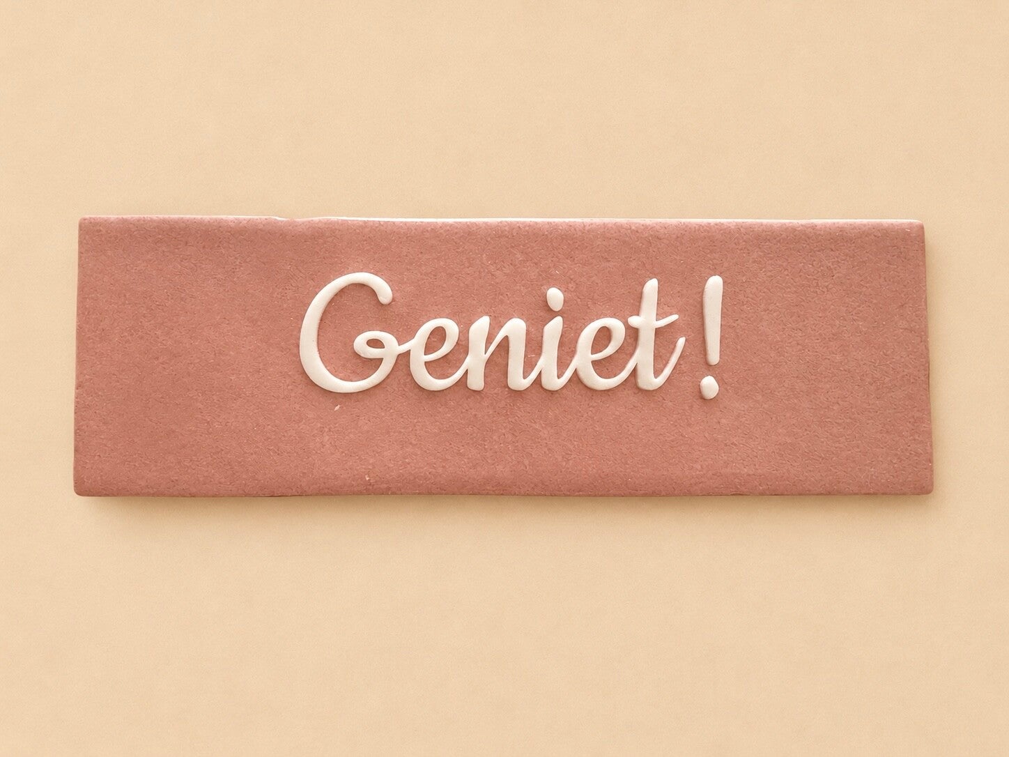 “Geniet!”