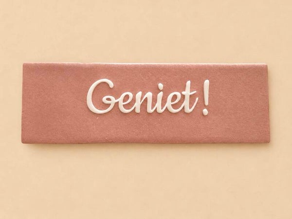 “Geniet!”