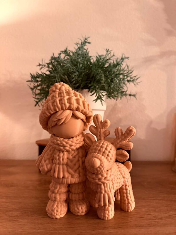 Winterjongen met rendier