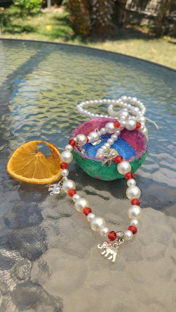 COLLANA DI PERLE LUNGA CON ELEFANTI