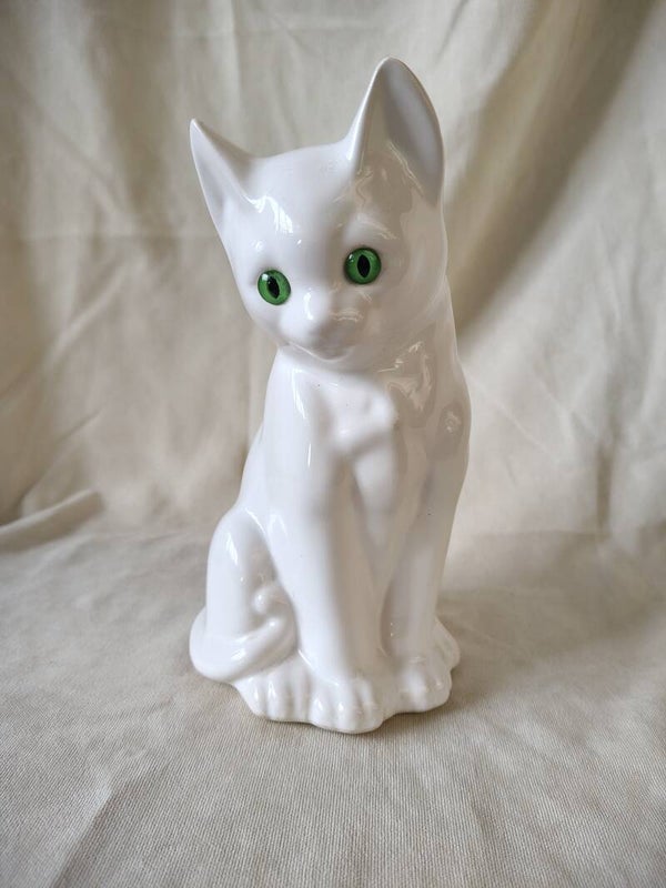 Vintage witte keramische kat met groene ogen