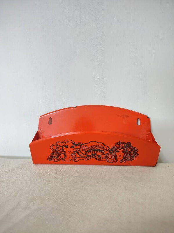 Vintage jaren 70 kammenhouder met echte flowerpower uitstraling