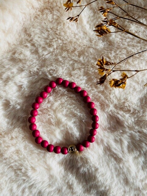 Kinderarmbandje fuchsia smiley