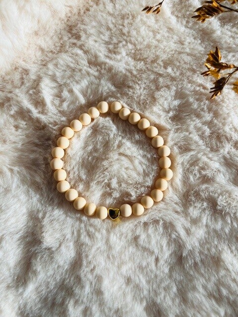 Kinderarmbandje peach hartje