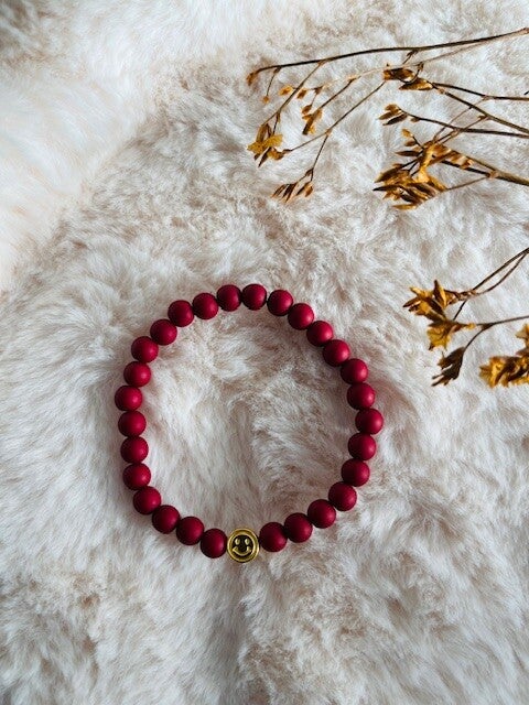 Kinderarmbandje donkerrood smiley