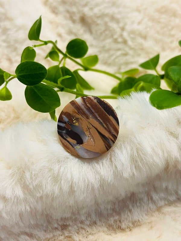 Ring bruin marmer
